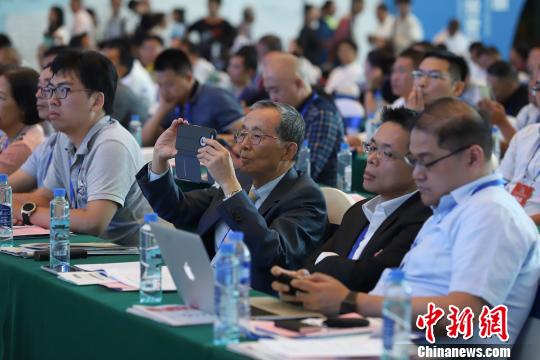 研討會現(xiàn)場圖?！■暮陚?攝